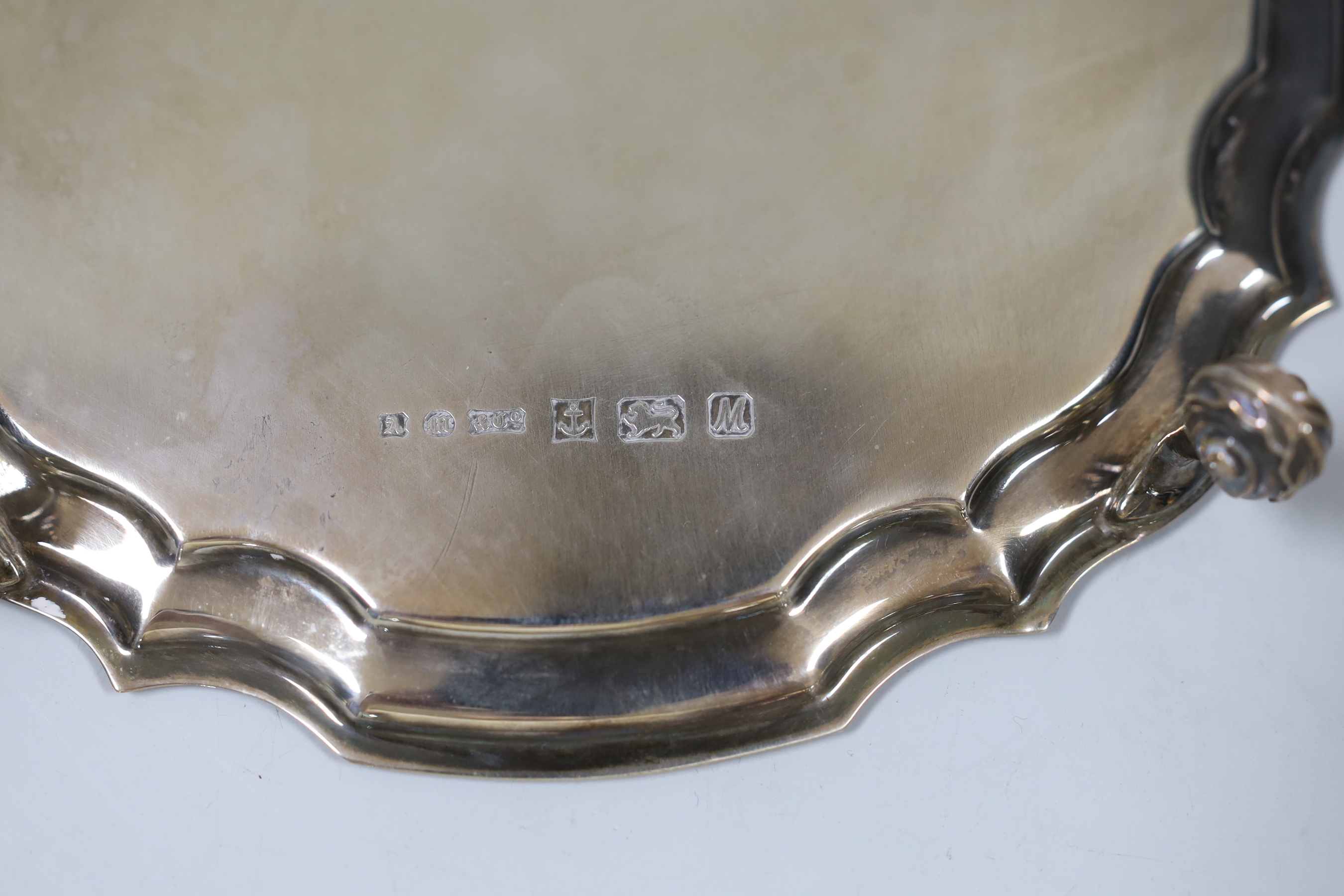 A modern circular silver waiter, A. Marston & Co, Birmingham, 1986, with engraved inscription, 20.6cm, 11.9oz., NB: From the Estate of Rt Hon Lord Lawson of Blaby